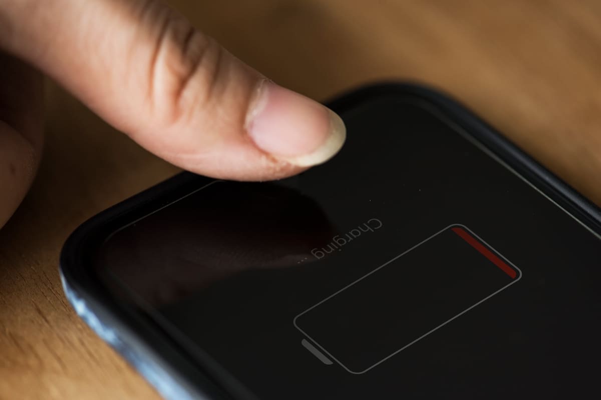 A mobile phone showing an almost empty battery